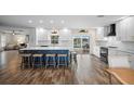 Spacious kitchen with island, stainless steel appliances, and water views at 1230 Swan Ct, Punta Gorda, FL 33950