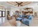 Spacious living room with high ceilings and a large sectional sofa at 238 Lido Dr, Punta Gorda, FL 33950