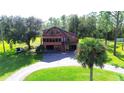 Two-story home on a large lot with circular driveway at 3681 Hidden Valley Cir, Punta Gorda, FL 33982