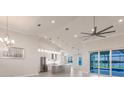 Open floor plan with a large kitchen island and water views at 17183 Ohara Dr, Port Charlotte, FL 33948