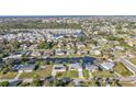 This waterfront property has a private canal, lush landscaping, and neighborhood amenities at 3225 Magnolia Way, Punta Gorda, FL 33950