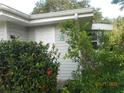 Front entrance of the house with well-maintained shrubs at 503 Myrtle St, Punta Gorda, FL 33950