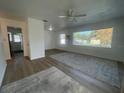 Bright living room with large windows and neutral flooring at 21130 Meehan Ave, Port Charlotte, FL 33952