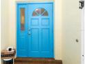 Bright blue front door welcomes you into the home at 4290 Randypaar St, Port Charlotte, FL 33948