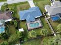 Single-story home with a pool and fenced backyard at 1370 Kenmore St, Port Charlotte, FL 33952