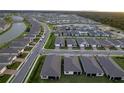 Community overview showcasing numerous houses and landscaping at 16138 Highgate St, Port Charlotte, FL 33953