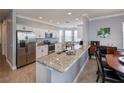 Modern kitchen with stainless steel appliances and granite countertops at 25623 Heritage Lake Blvd. # 57, Punta Gorda, FL 33983