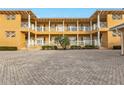 Building exterior showcasing architectural details and landscaping at 3216 Purple Martin Dr # 122, Punta Gorda, FL 33950