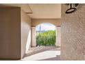 Covered balcony overlooking tropical landscaping at 1349 Aqui Esta Dr # 125, Punta Gorda, FL 33950