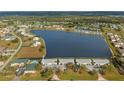 Condos near a lake with surrounding landscape at 1512 Rio De Janeiro Ave # 111, Punta Gorda, FL 33983