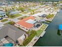 Aerial view of a waterfront home with a private pool and dock at 1923 Pennsylvania Ave, Englewood, FL 34224