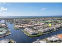 Aerial view showing property location near the waterway in a residential area at 3800 Bal Harbor Blvd # 312, Punta Gorda, FL 33950