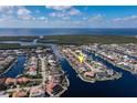 An aerial view highlighting the property's canal-front location at 2813 Sancho Panza Ct, Punta Gorda, FL 33950