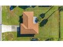 Top-down view of single Gathering home and surrounding yard at 18511 Lake Worth Blvd, Port Charlotte, FL 33948