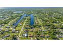 Wide aerial view of waterfront homes and community at 18511 Lake Worth Blvd, Port Charlotte, FL 33948