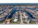 Aerial view showcasing home's location in a waterfront community at 2501 Rio Largo Ct, Punta Gorda, FL 33950
