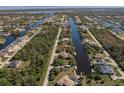 Wide aerial showcasing home location and neighborhood at 15600 Aldama Cir, Port Charlotte, FL 33981