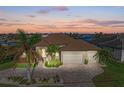 Aerial view of house, landscaping, and driveway at 3736 Bal Harbor Blvd, Punta Gorda, FL 33950