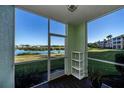 Screened porch overlooking the lake and community at 2160 Heron Lake Dr # 104, Port Charlotte, FL 33983