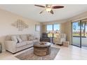 Living room featuring a neutral color palette and ample natural light at 3256 White Ibis Ct # 14 A, Punta Gorda, FL 33950