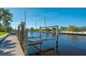 Private dock with lift for easy boat access at 108 Roselle Ct, Port Charlotte, FL 33952