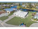 Single-story home with a canal-side location and spacious yard at 21062 Edgewater Dr, Port Charlotte, FL 33952