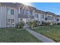 Front view of condo building showcasing its design at 21320 Brinson Ave # 117, Port Charlotte, FL 33952