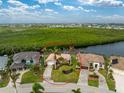 An aerial view of the home and surrounding neighborhood, waterfront location at 3310 Tripoli Blvd, Punta Gorda, FL 33950