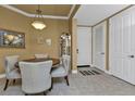 Bright dining area with table and four chairs at 99 Vivante Blvd # 312, Punta Gorda, FL 33950