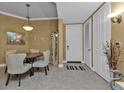 Bright dining area with table and four chairs at 99 Vivante Blvd # 312, Punta Gorda, FL 33950