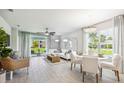 Open living and dining area with light flooring and neutral decor at 2051 Royal Tern Cir, Punta Gorda, FL 33983