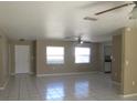 Open living area with tile floors and neutral walls at 21471 Dranson Ave, Port Charlotte, FL 33952