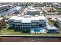 Community pool and spa with condos and waterfront view at 1600 W Marion Ave # 234, Punta Gorda, FL 33950
