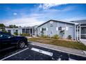 Condo building with parking and landscaping at 3300 Loveland Blvd # 3103, Punta Gorda, FL 33980