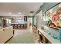 Open-concept living area with updated kitchen, dining, and living space at 3404 Depew Ave, Port Charlotte, FL 33952