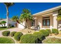 Single-story home with a double door entry and lush landscaping at 3700 Candia Dr, Punta Gorda, FL 33950