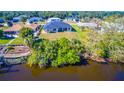 Aerial view showing home's backyard and canal access at 158 Eppinger Dr, Port Charlotte, FL 33953