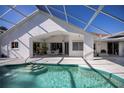 Spacious pool and patio area with a screened enclosure at 3262 Steadman St, Punta Gorda, FL 33980