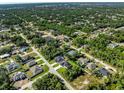 An aerial view of a residential neighborhood with many single-Gathering houses at 4301 Marcella Ter, North Port, FL 34286