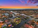 Waterfront property situated in a residential community near the water at 1422 Kittiwake Dr, Punta Gorda, FL 33950