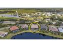 This property is situated on a tranquil lake in a desirable neighborhood at 3230 Bay Ridge Way, Port Charlotte, FL 33953