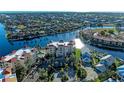 Waterfront property with lush landscaping and boat docks at 3340 Wood Thrush Dr # 323, Punta Gorda, FL 33950