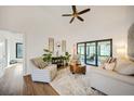 Relaxing Gathering room featuring sliding glass doors leading to a screened porch at 2137 Adirondack Ln, Port Charlotte, FL 33953