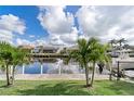 Private dock with boat lift offering direct access to the waterway at 500 Andora Dr, Punta Gorda, FL 33950