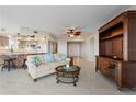 Spacious living room with kitchen, island, and water views at 101 N Marion Ct # 225, Punta Gorda, FL 33950