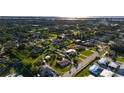 Lovely home with a private fenced yard, mature trees and lush landscaping in a desirable neighborhood at 1713 Belvidere Rd, Englewood, FL 34223