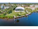 Waterfront property with private dock and spacious backyard at 18138 Petoskey Cir, Port Charlotte, FL 33948