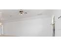 Spacious living room with high ceilings and neutral walls at 1160 Rizzo St, Port Charlotte, FL 33952