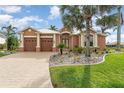 Spacious two-car garage and lush landscaping complete this charming home at 3324 Antigua Dr, Punta Gorda, FL 33950