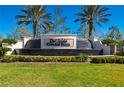 Del Webb Cypress Falls community entrance with fountain and landscaping at 2427 Daisy Dr, North Port, FL 34289